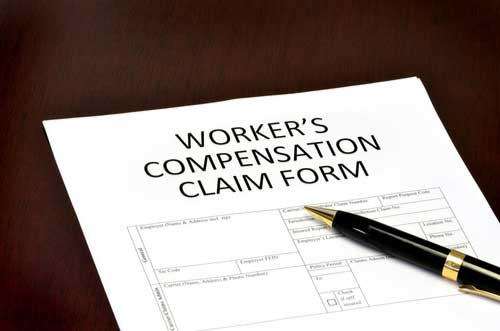 Workers' comp claim form, North Atlanta workers' compensation lawyer concept