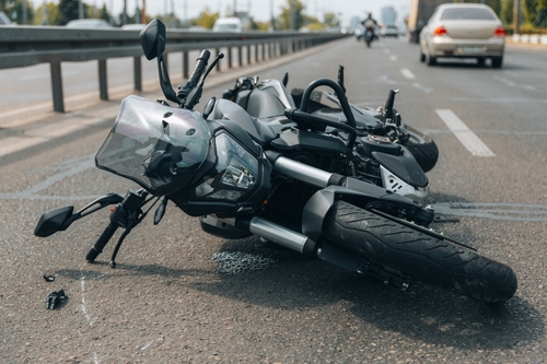 Columbus motorcycle accident lawyer, motorcycle accident lawyer looking over the aftermath of a motorcycle accident with a client preparing to file a motorcycle accident claim. 