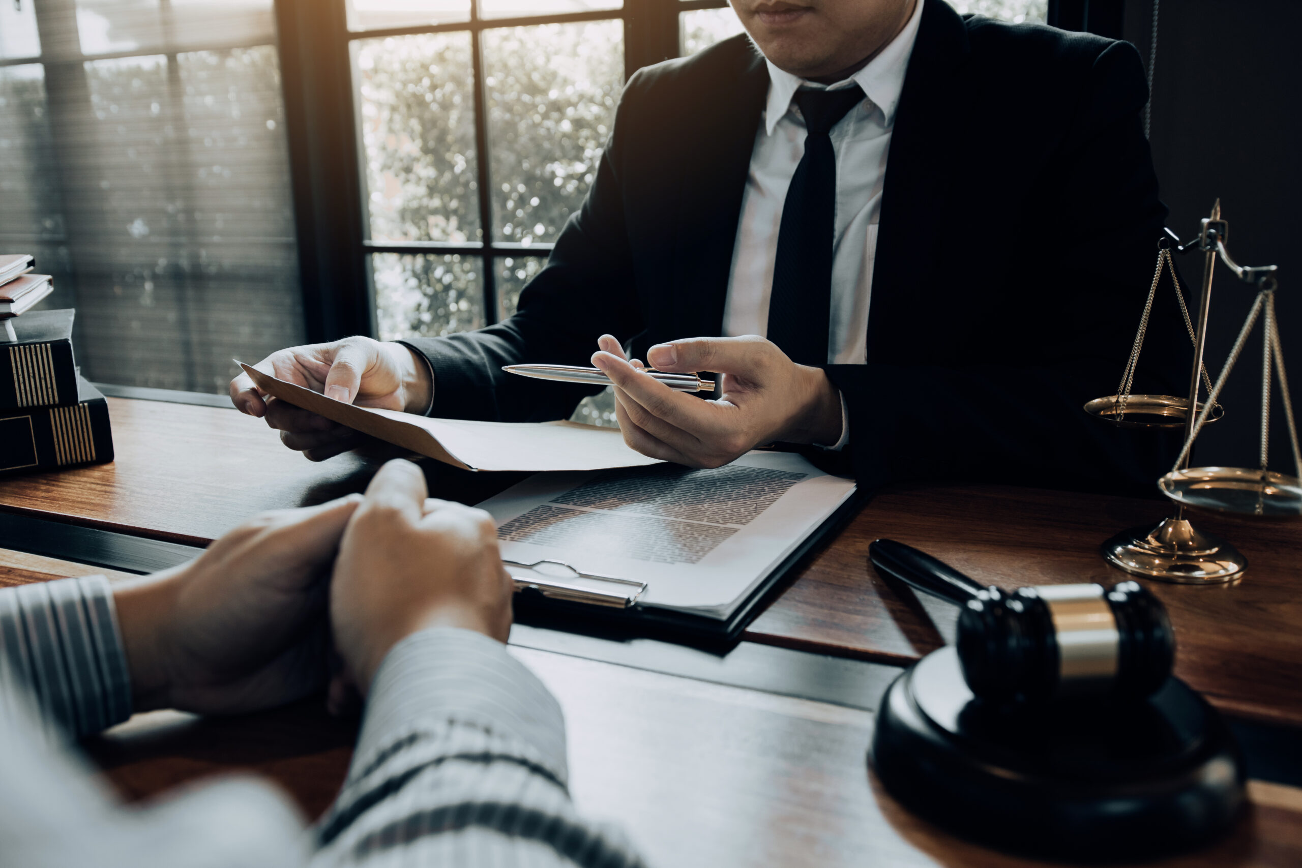 Car accident victim consulting with 1Georgia Personal Injury Lawyers attorney about filing claim without police citation