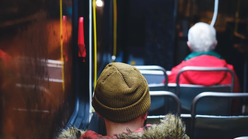 2 people on a public bus